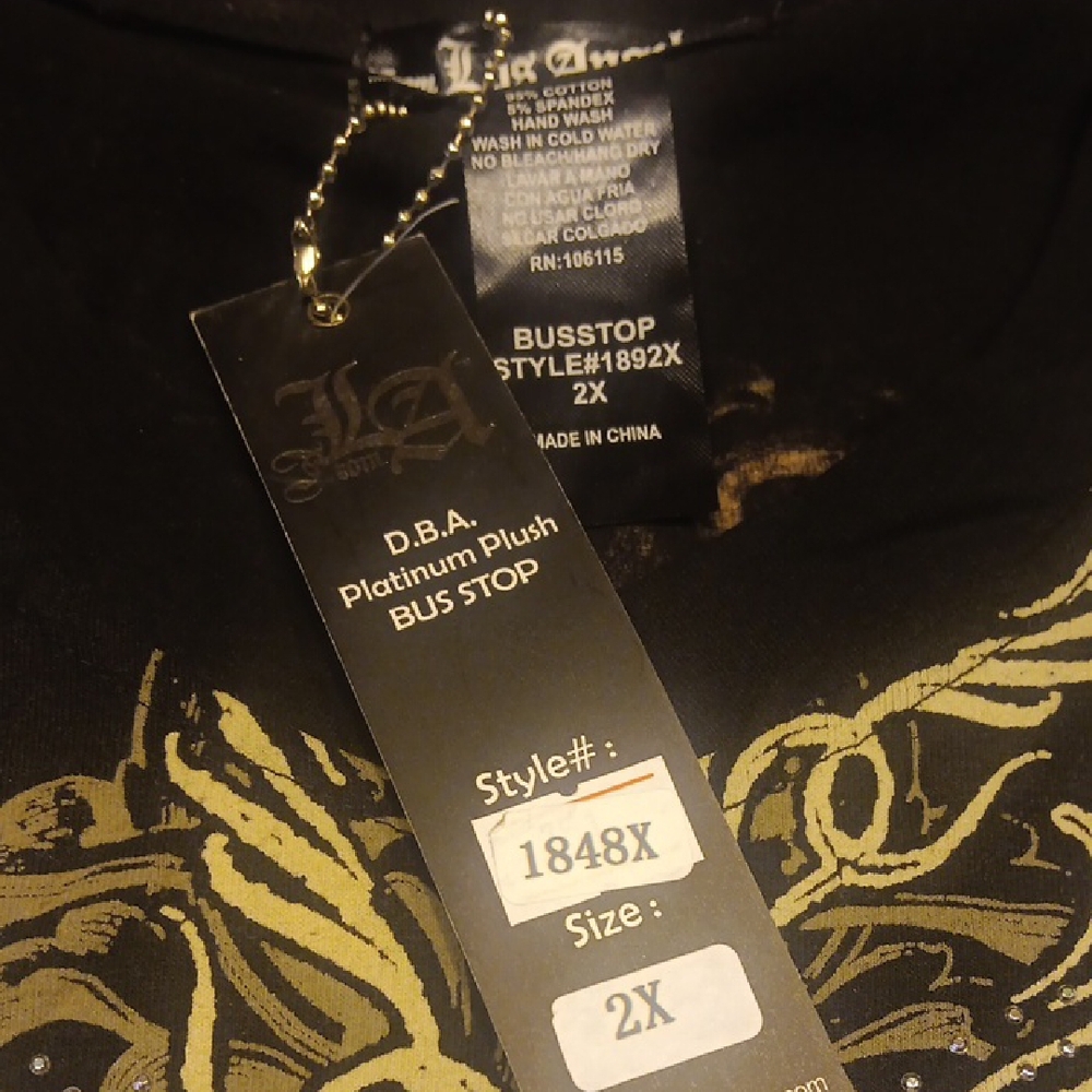 NWT. Black Cold Shoulder Long Sleeve Top with Intricate Design Front And Back - Picture 2 of 10